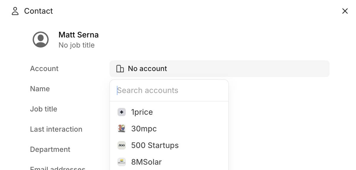 Contact editor showing option to attach an account with dropdown list of available accounts