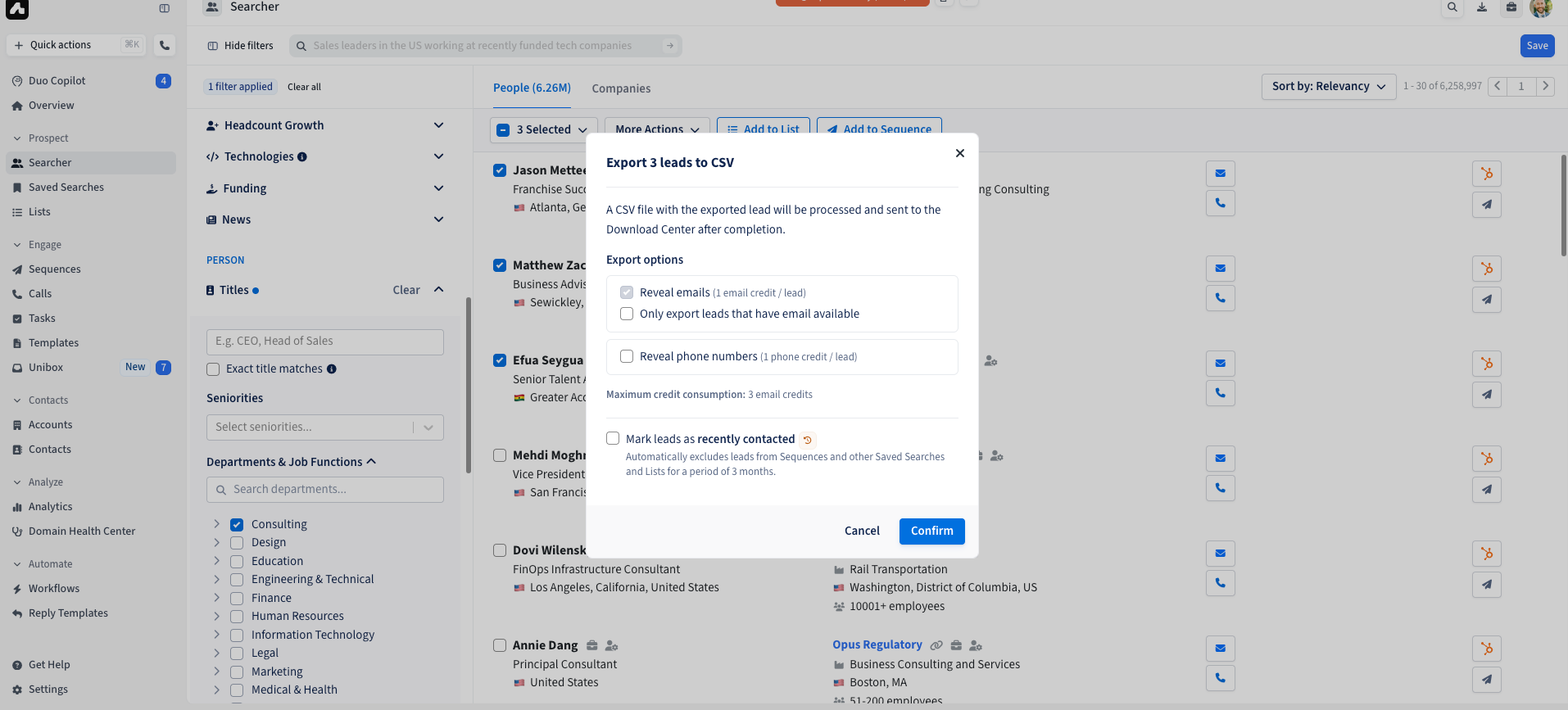 Image of a user interface displaying the export options for leads in a searcher tool. The window includes options to reveal emails, phone numbers, and a checkbox for 'Mark leads as recently contacted.'