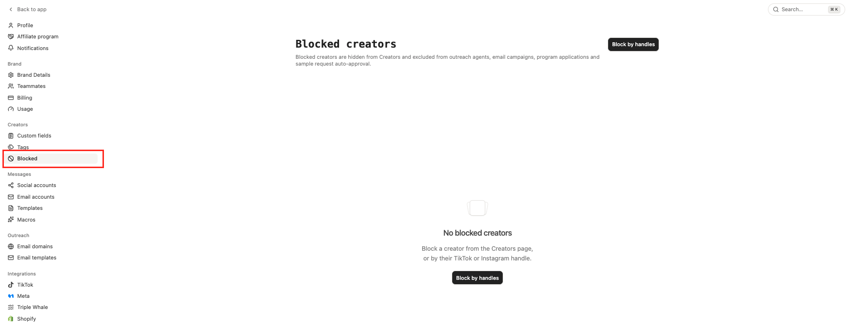 The Blocked creators page in Settings before any creator is blocked, with Blocked selected under Creators and the Block by handles button at the top right