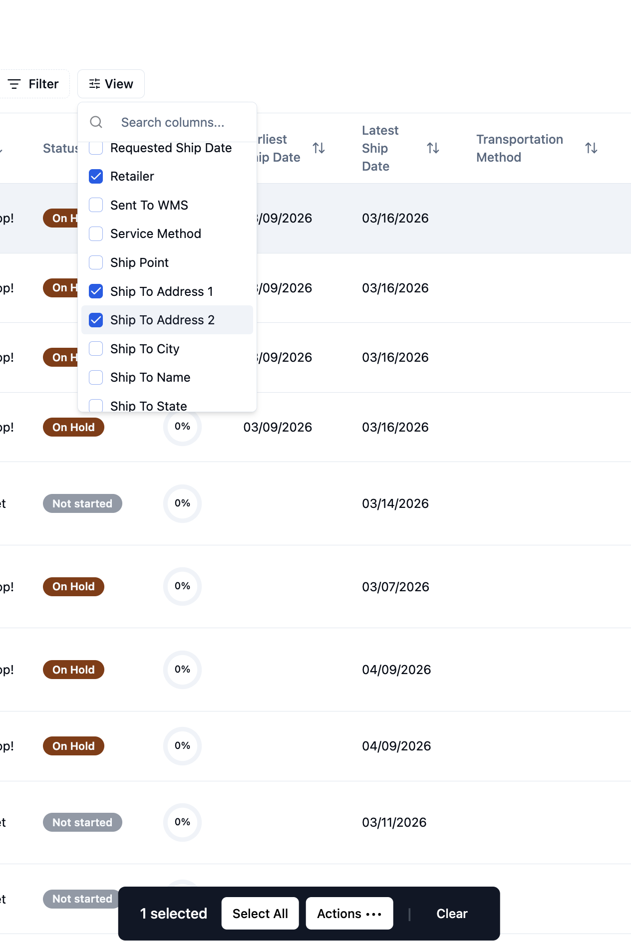 Image of a software interface showing a list of orders with a filter dropdown expanded to display columns (Retailer, Ship To Address 2, Ship To Address 1, etc.), a row of selectable items, and a bottom action bar with buttons (Select All, Actions...).